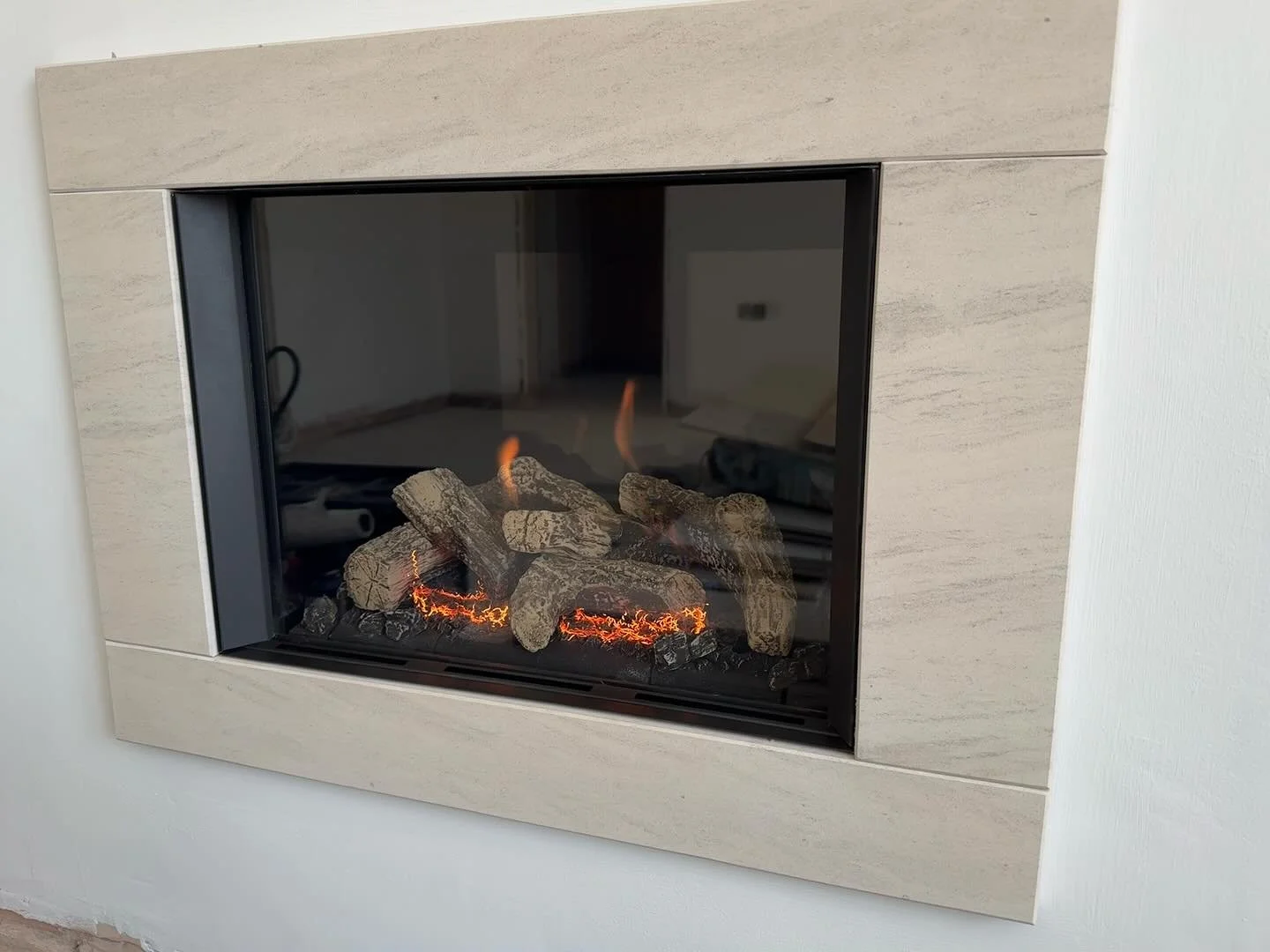 Installed a Riva2 500 gas fire complete with liner kit and limestone slips. This one wasn&rsquo;t straightforward &mdash; the opening needed remedial work, including new lintels, to make it safe and ready for install. Returned today to commission the