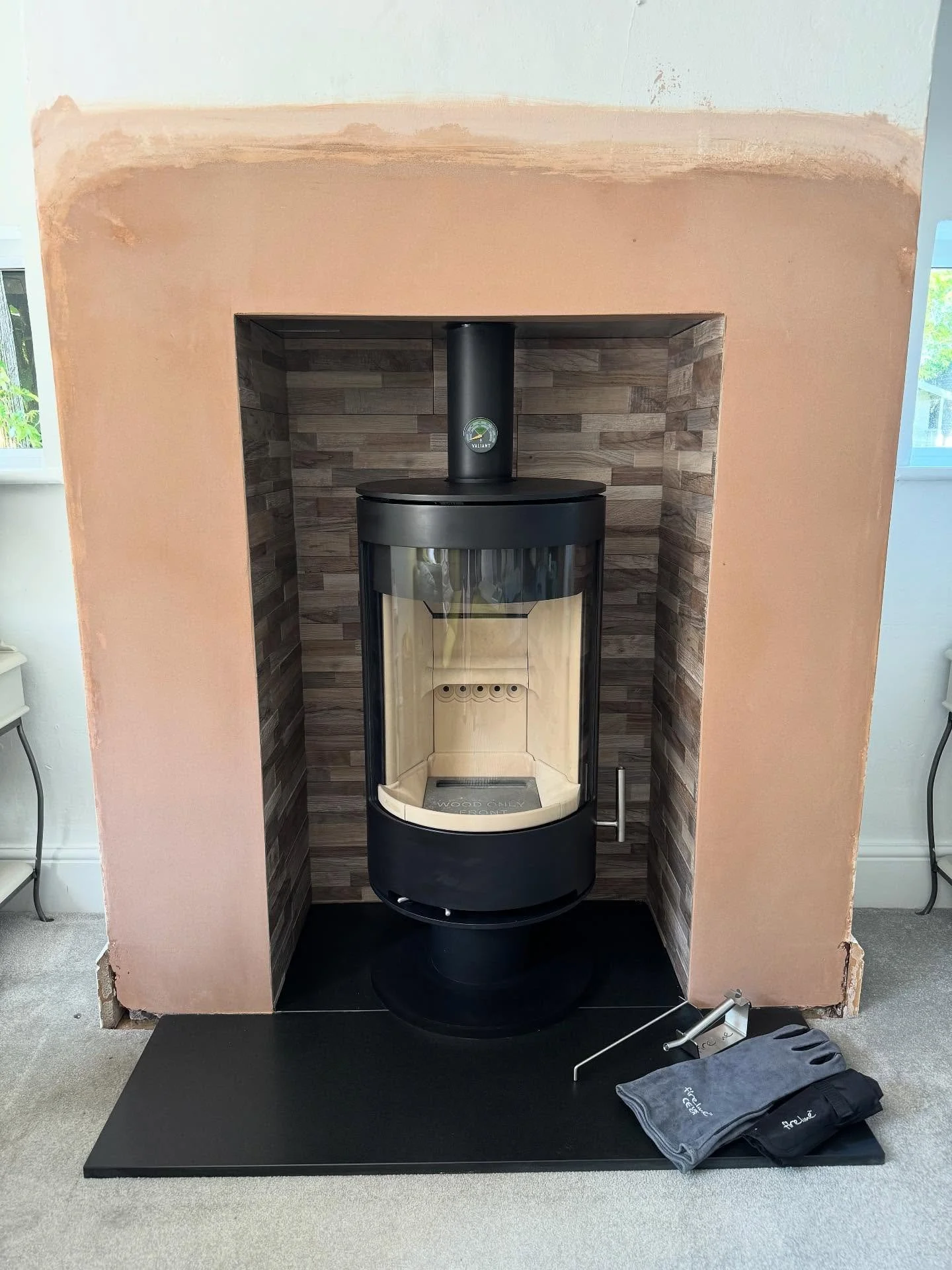 🔥 Transformation complete! We&rsquo;ve installed a stunning Purevision PVR stove with a sleek granite hearth, wood-effect tile chamber, and full liner kit. The old stock liner? Removed the hard way&mdash;pulled out piece by piece from the top! The r