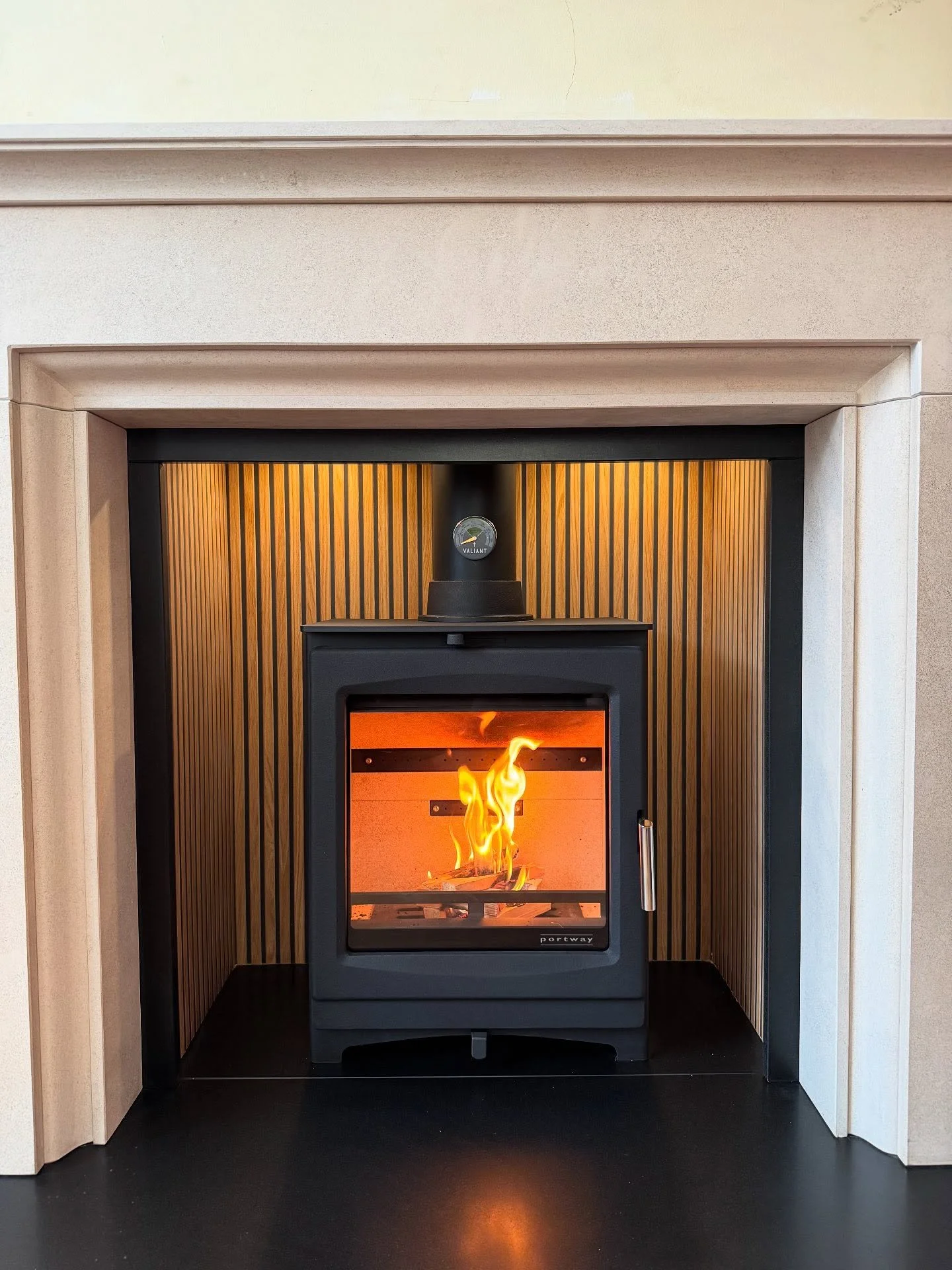🔥 Just completed this stunning install featuring the Portway Luxima Multi-Fuel Stove, set in a tiled wood slat panelled chamber, finished with a limestone fireplace and honed granite hearth &ndash; a perfect blend of style and warmth!

Big thanks to