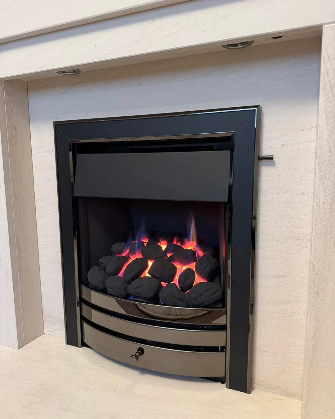 ✨ Another stunning install complete! ✨
This one features a 54&rdquo; Portuguese limestone fireplace with built-in downlights, paired with the sleek Wildfire Cavello HE gas fire 🔥.

A modern centrepiece that combines style and efficiency 👌

Supplied