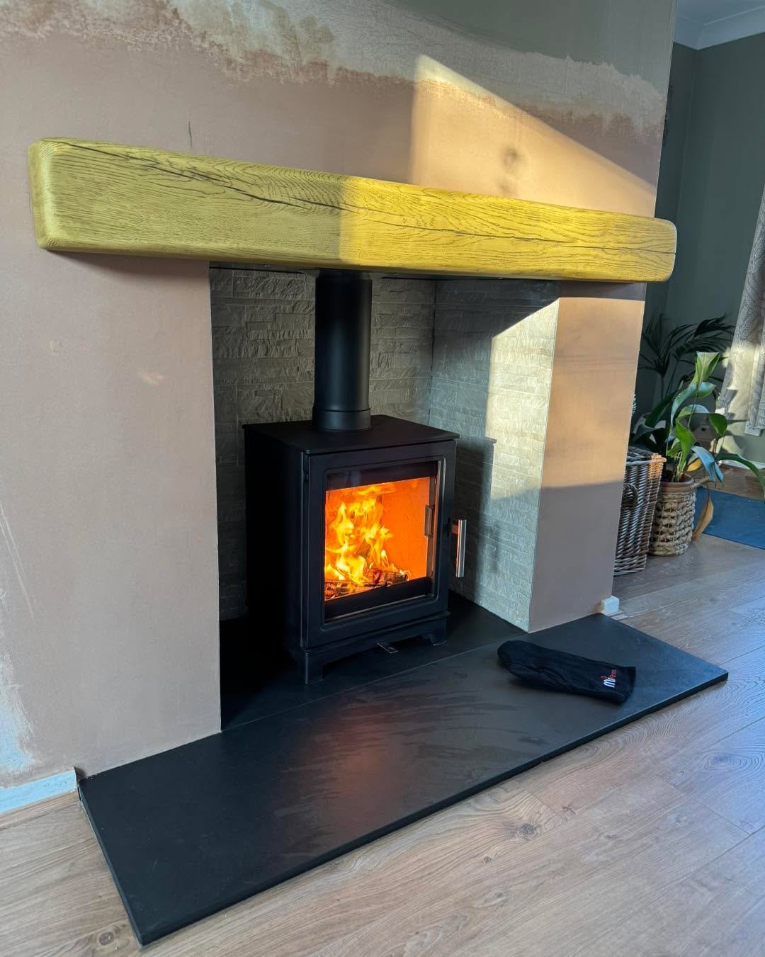 Another stunning installation completed 🔥

This fireplace features a Brazilian slate hearth, paired with customer-selected chamber tiles to perfectly match their style. The look is brought together with a light oak geocast beam and finished off with