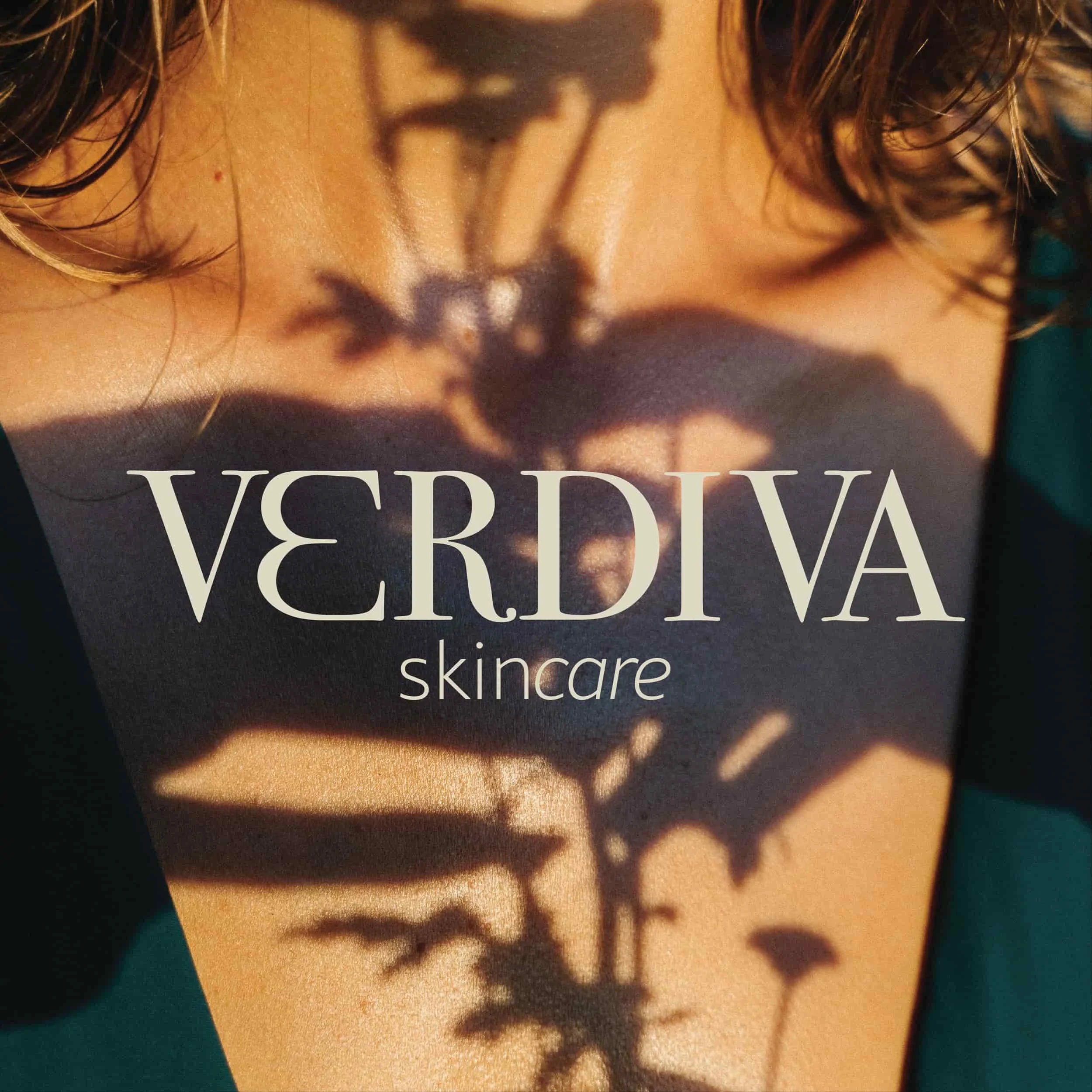 Close-up of a person's chest with shadows of a plant cast on skin, overlaid with the words 'VERDIVA skincare'.