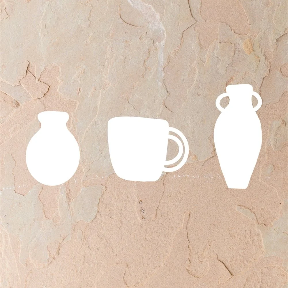 Silhouettes of a small vase, a coffee mug, and a tall vase on a textured beige wall.