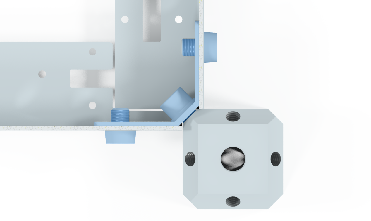 Close-up of a metallic mechanical or industrial component with blue screws or bolts, showing threaded holes and a central circular opening.