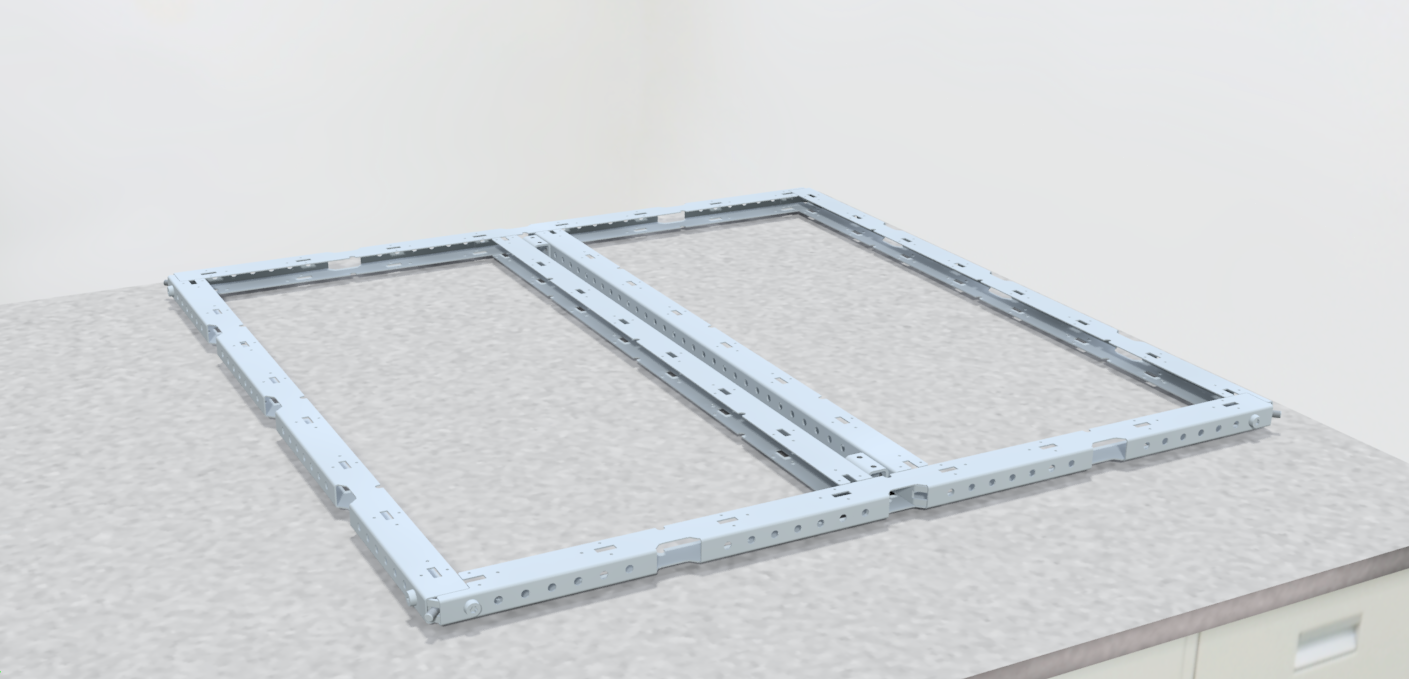 A metal frame, likely part of a construction or furniture assembly, resting on a grey countertop surface.