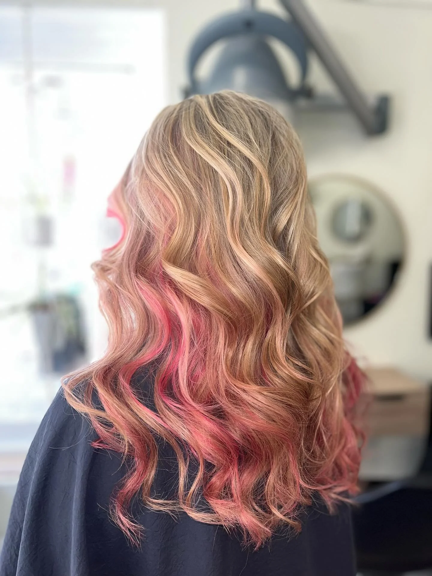 Blonde with a pop of pink 💛💖 Loving this dreamy combo of bright highlights and colourful lowlights &mdash; the perfect end-of-summer refresh! Who else is feeling bold with their colour this season? ✨
.
.
.
#BlondeHighlights #PinkLowlights #HairTran