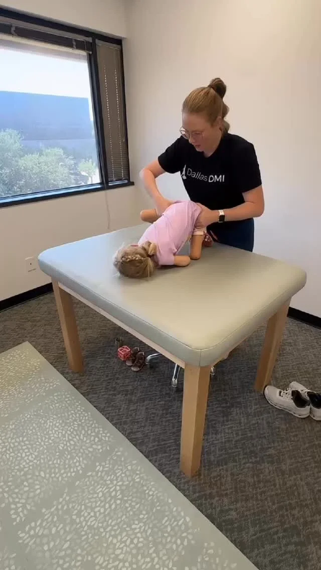 you may be curious… what exactly is DMI and how might my child benefit?
Dynamic Movement Intervention is an evidence based therapy technique used to promote gross motor development in children who have developmental delays, or are at risk fo
