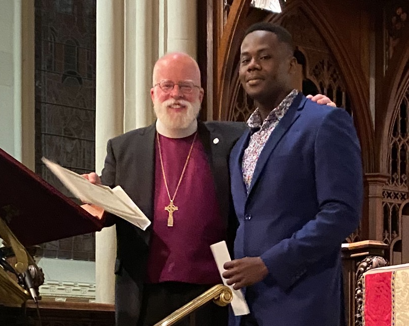 2022 Recipient Chnidcar "Golo" Fortune, accompanied by Bishop Andrew M. L. Dietsche