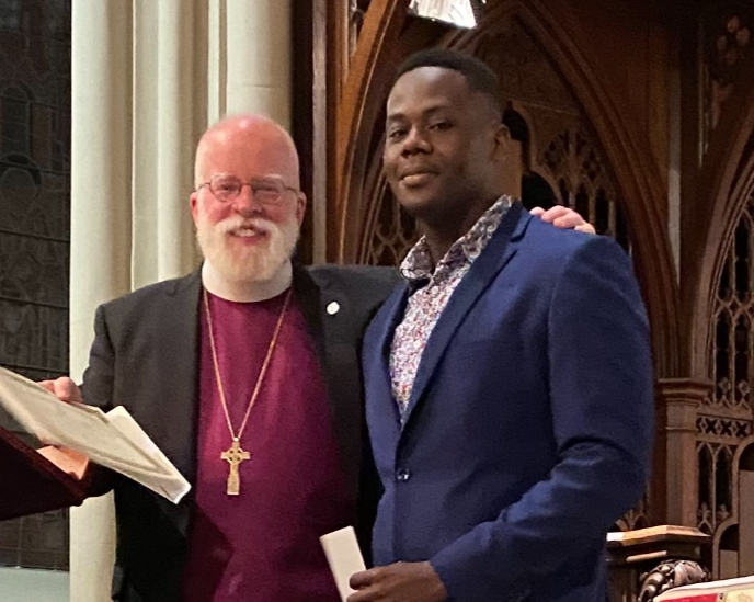 2022 Recipient Chnidcar "Golo" Fortune, accompanied by Bishop Andrew M. L. Dietsche