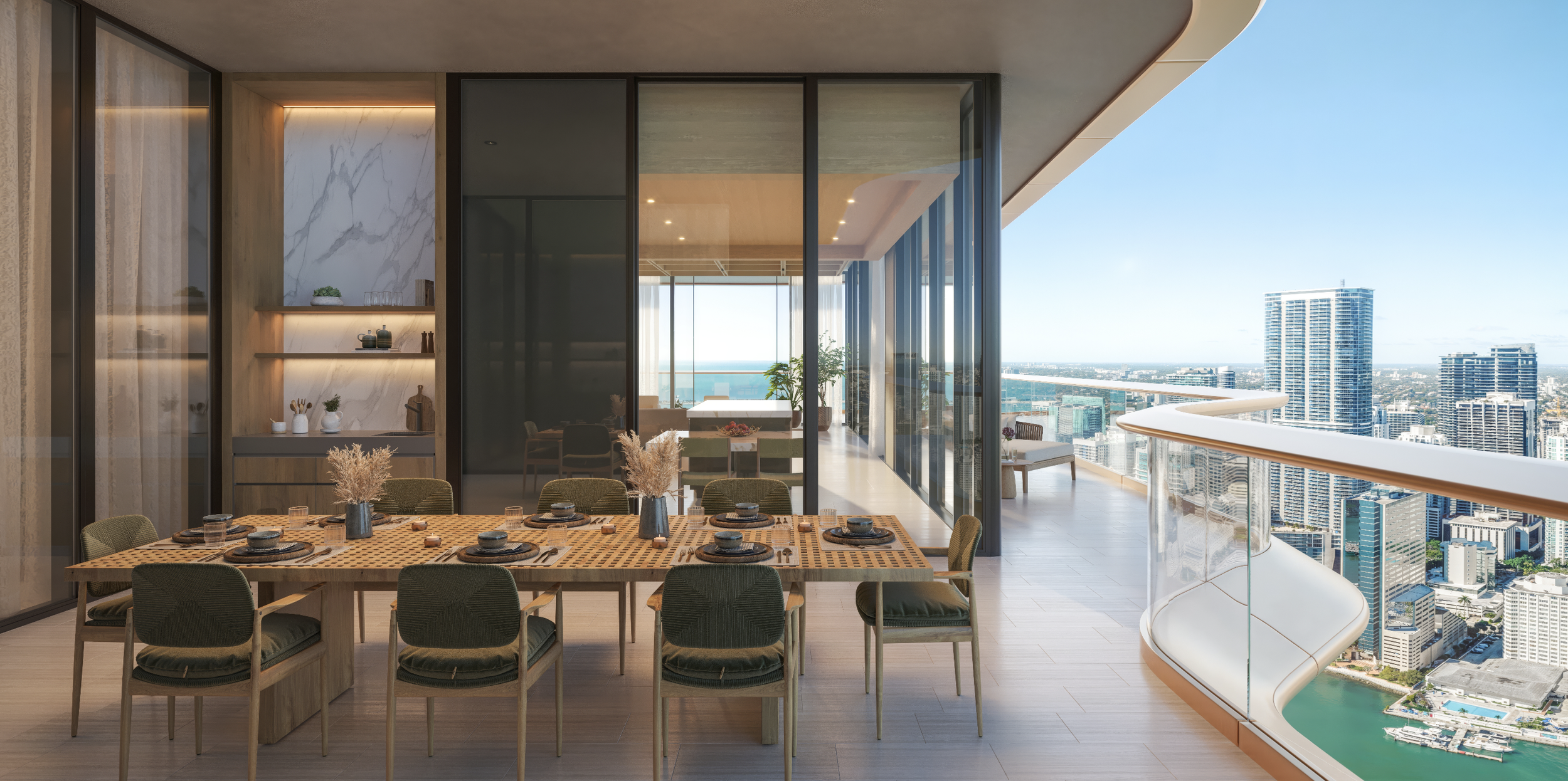 A modern high-rise apartment balcony with a square dining table set with dishes and vases, surrounded by nine chairs, overlooking a city skyline with tall buildings and a water body.