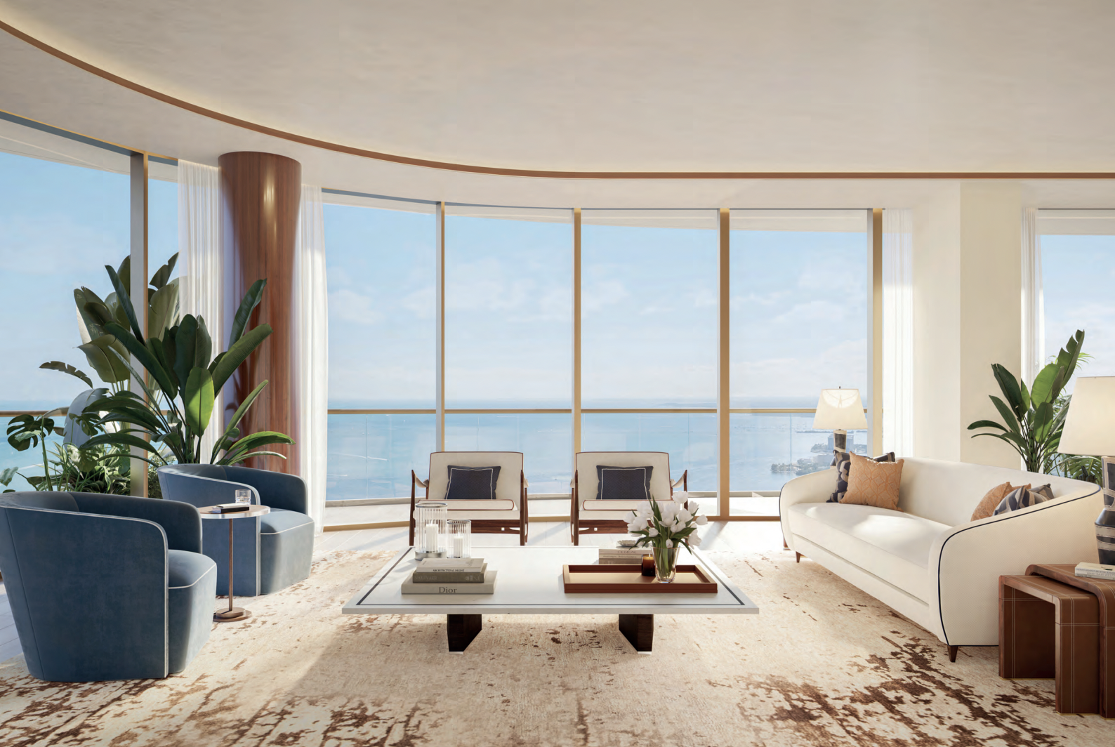 Elegant living room with large floor-to-ceiling windows overlooking water, featuring modern sofa, two armchairs, a coffee table with books and candles, and potted plants.