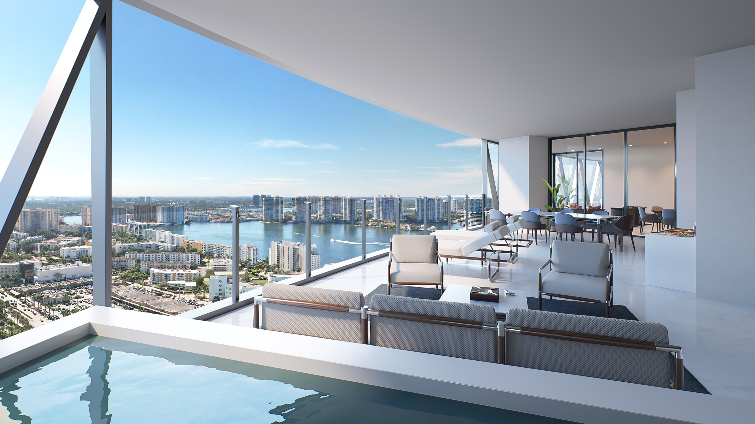 Luxury high-rise apartment with an outdoor terrace featuring a pool, lounge chairs, seating area, and panoramic view of a city skyline and river.