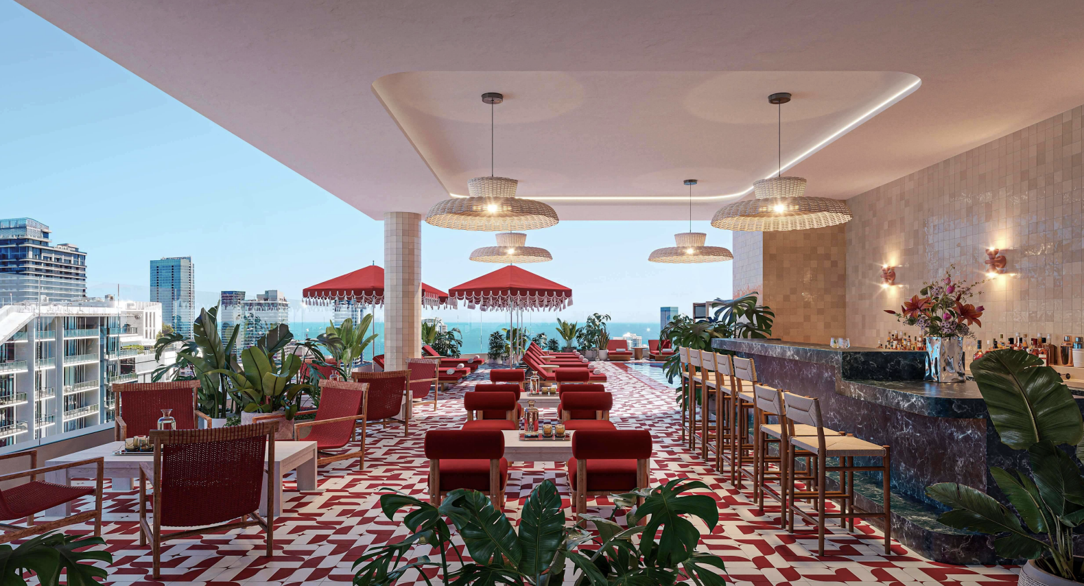 Luxury rooftop bar with red seating, green plants, and city view