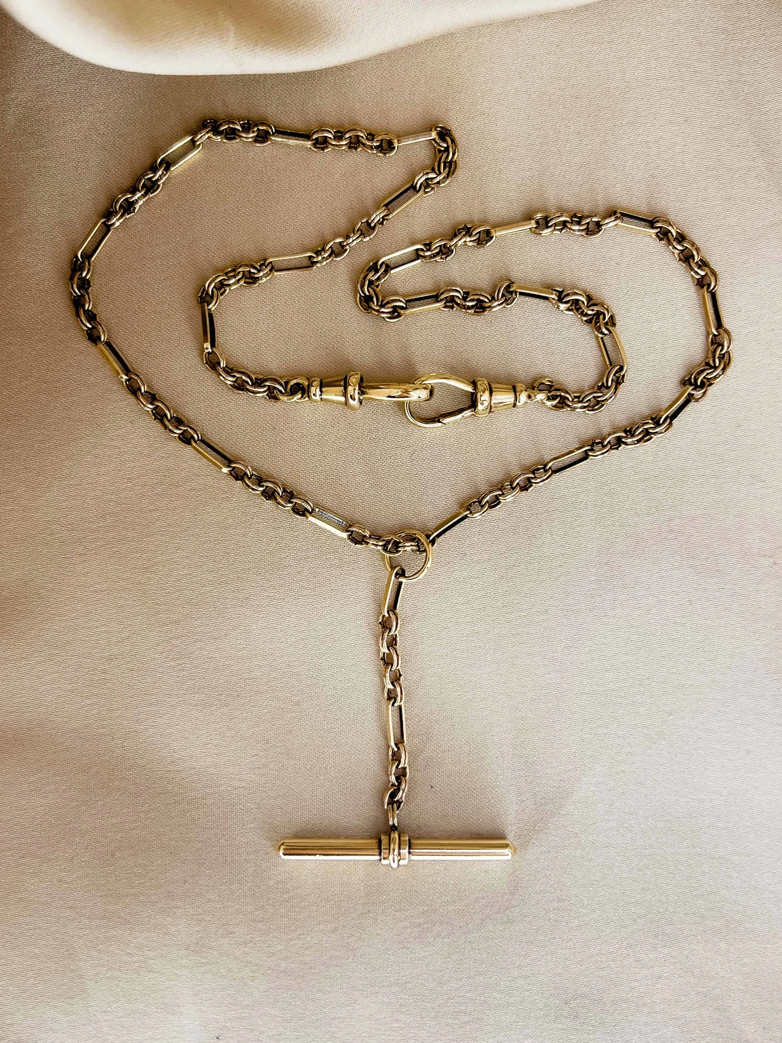 UnoAErre Trombone with T-bar and Double Dog Clips. 9ct.
