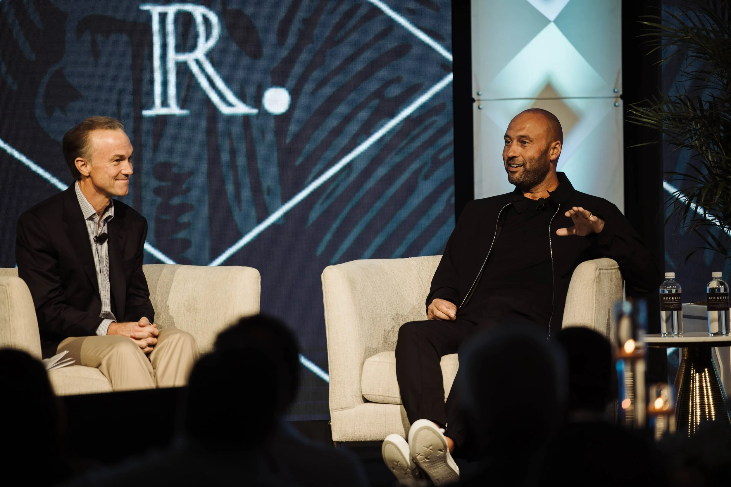 Derek Jeter and Gregory Fleming engage in a conversation at a corporate retreat at The Breakers Palm Beach.