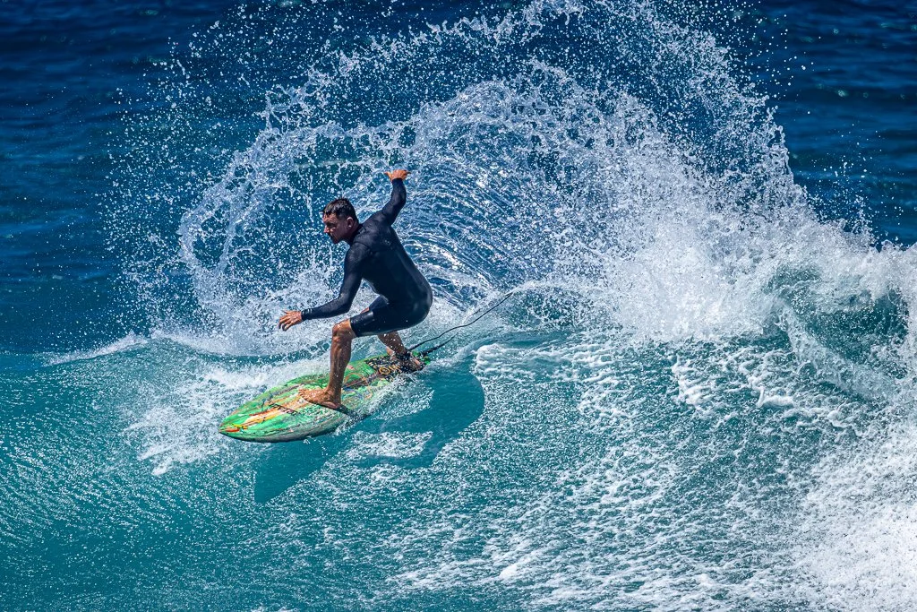 Surfer at Ho'okipa Beach Park on Maui by Ibach808