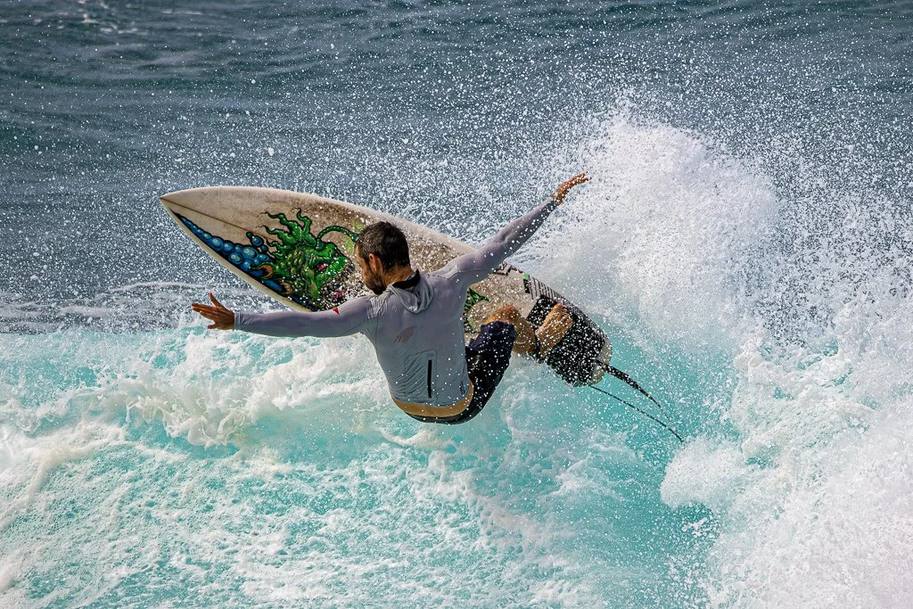 Surfer at Ho'okipa Beach Park on Maui by Ibach808