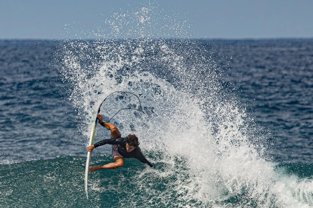 Surfer at Ho'okipa Beach Park on Maui by Ibach808
