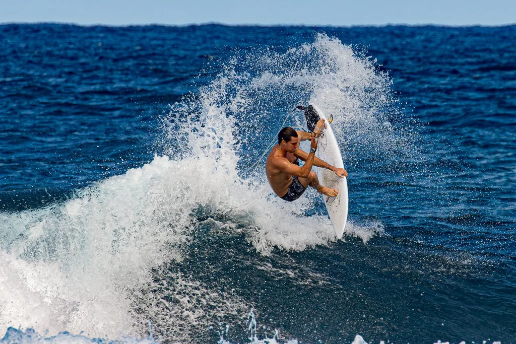 Surfer at Ho'okipa Beach Park on Maui by Ibach808