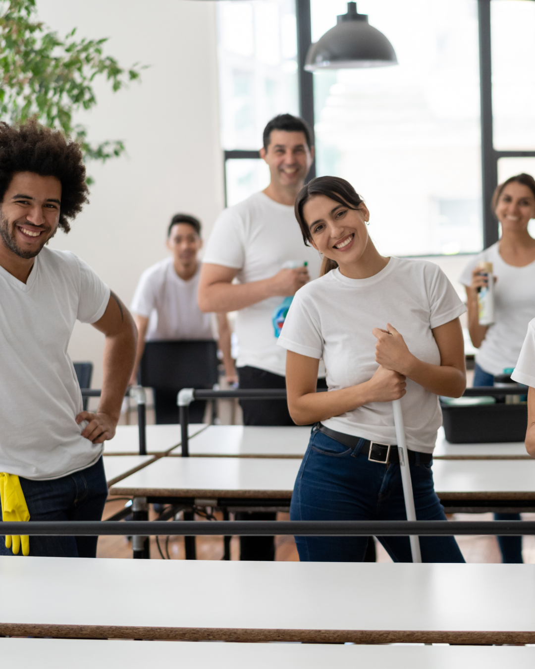 Cleaning crew smiling