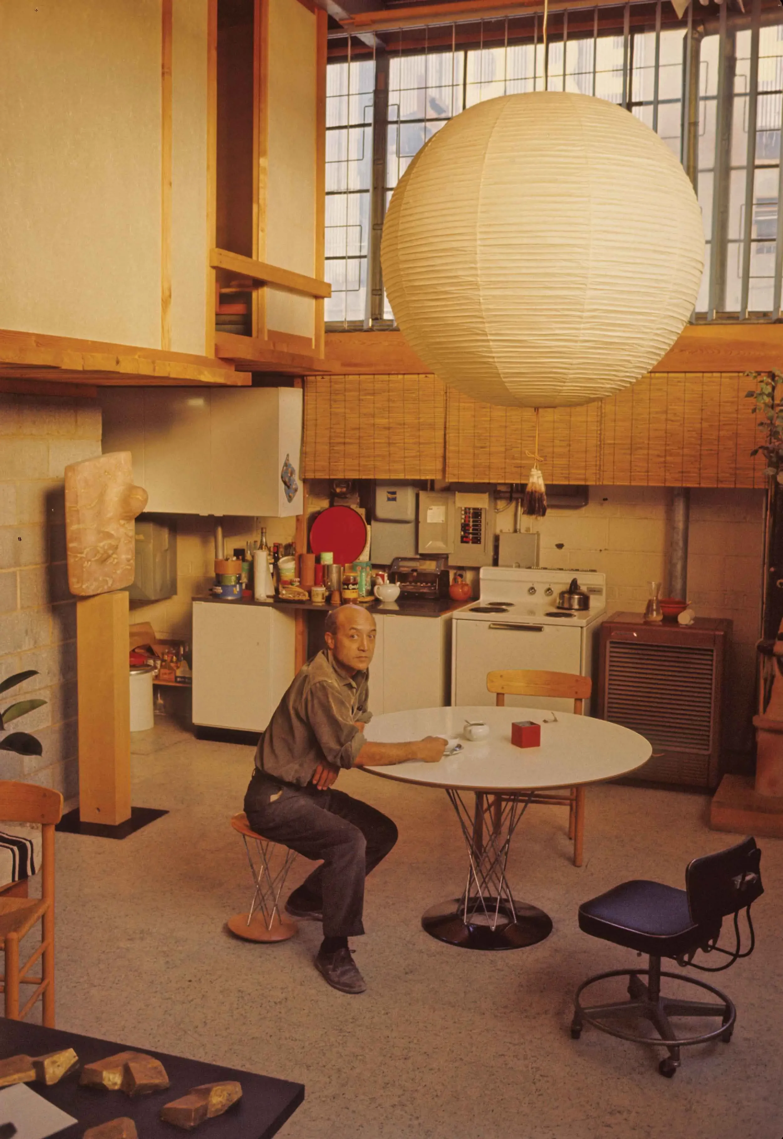 1-Isamu-Noguchi-in-his-Studio.webp