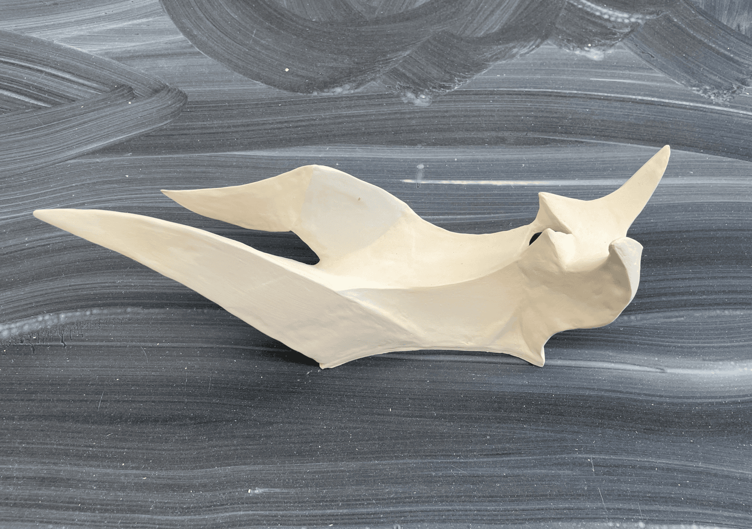 A horizontal view of "Up up up,"  a sculpture by Fang Yi Wu.