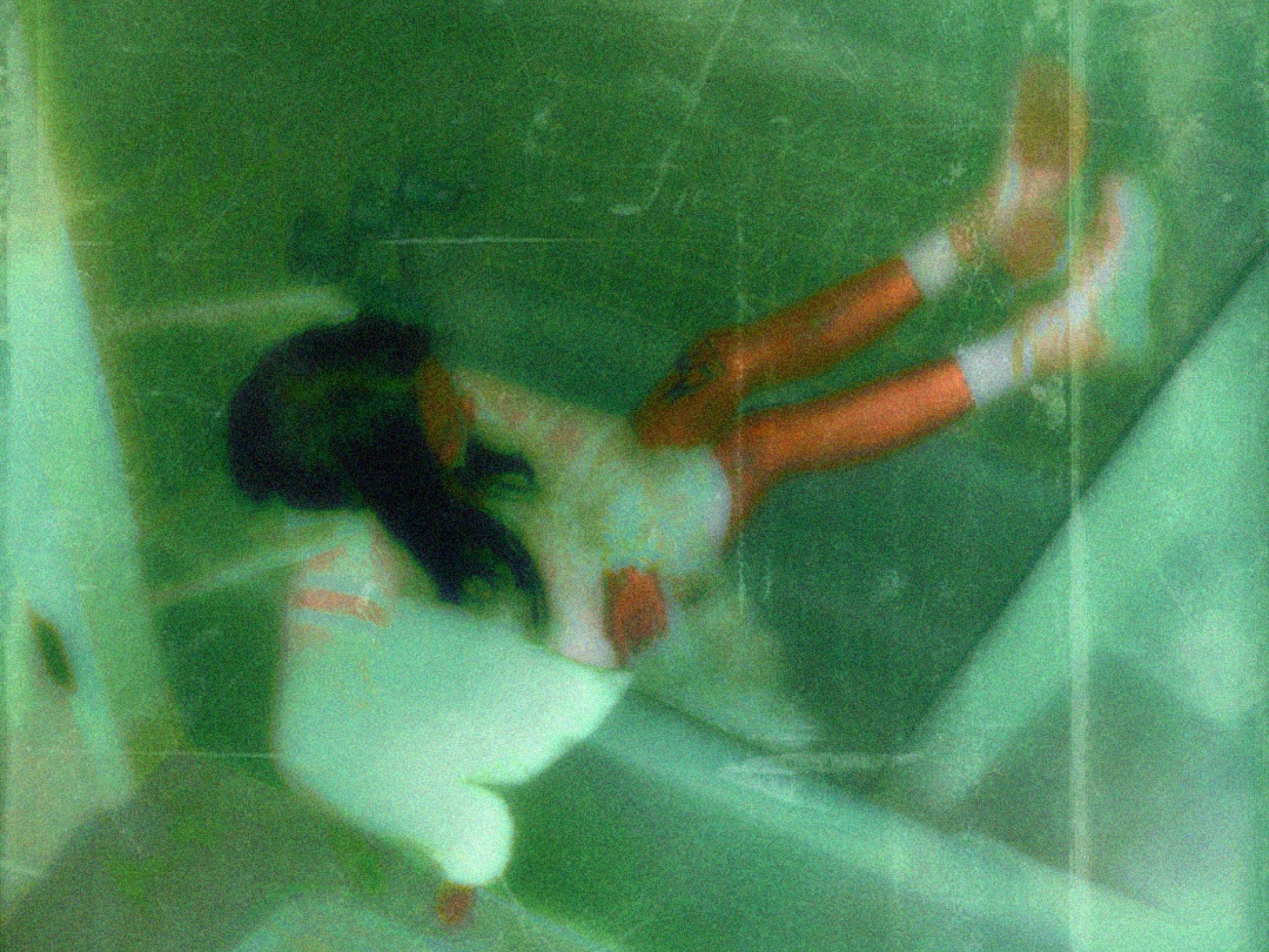 Wendi Ling lies in a bathtub.