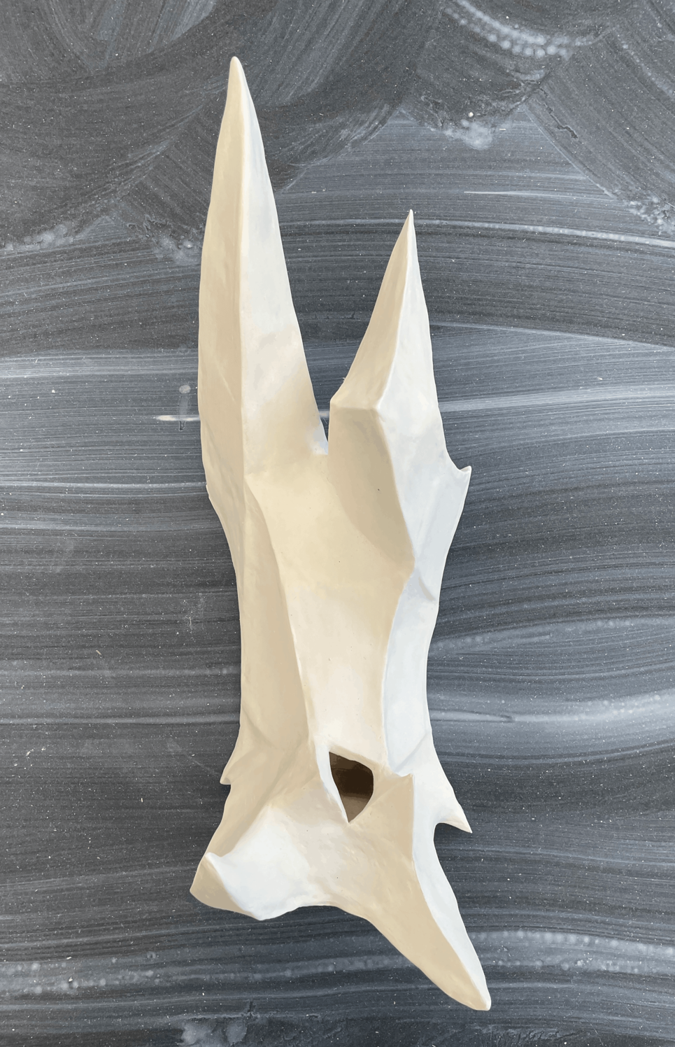 A vertical view of "Up up up,"  a sculpture by Fang Yi Wu