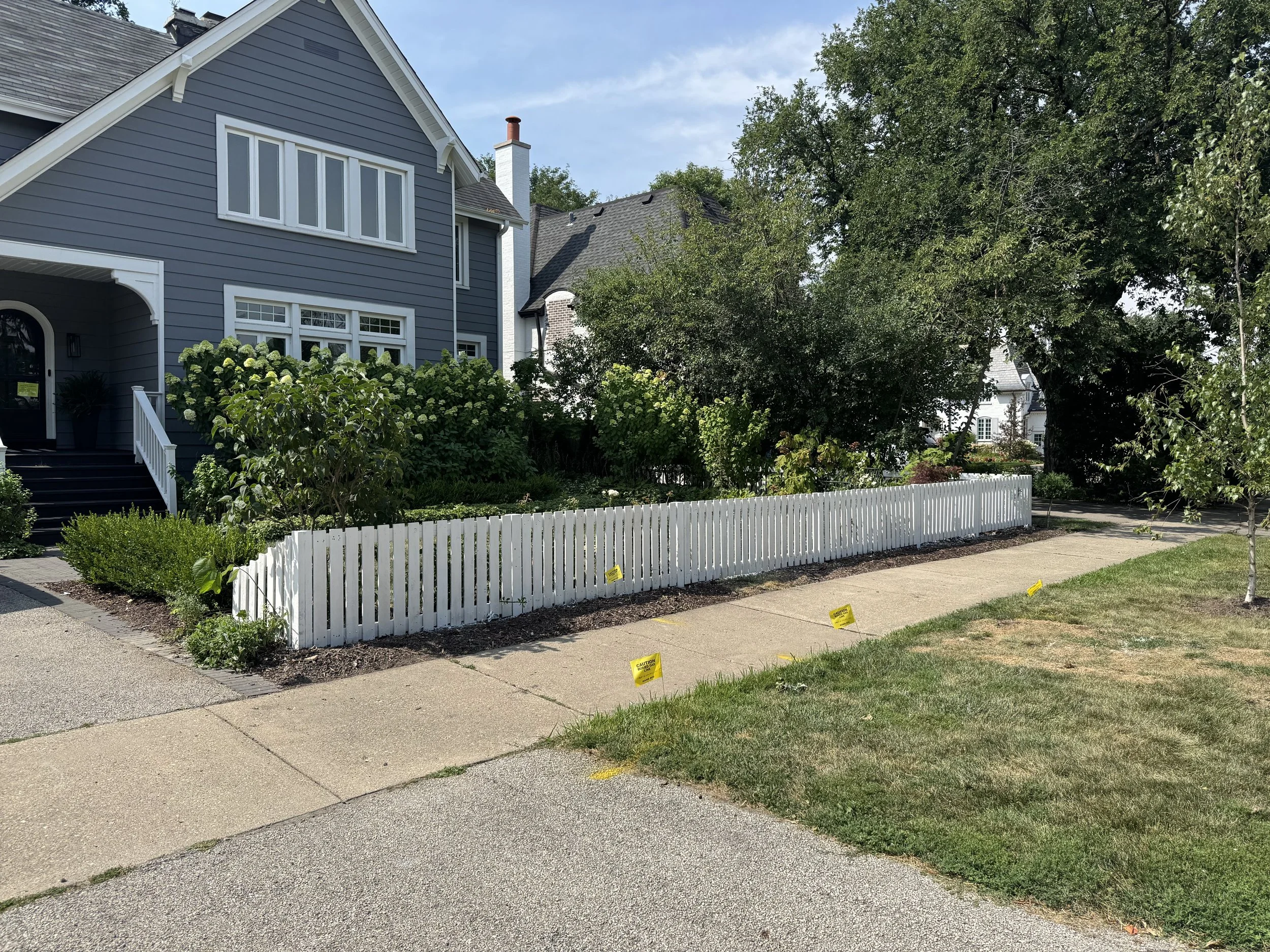 Custom fence installation & painting in Lake County.