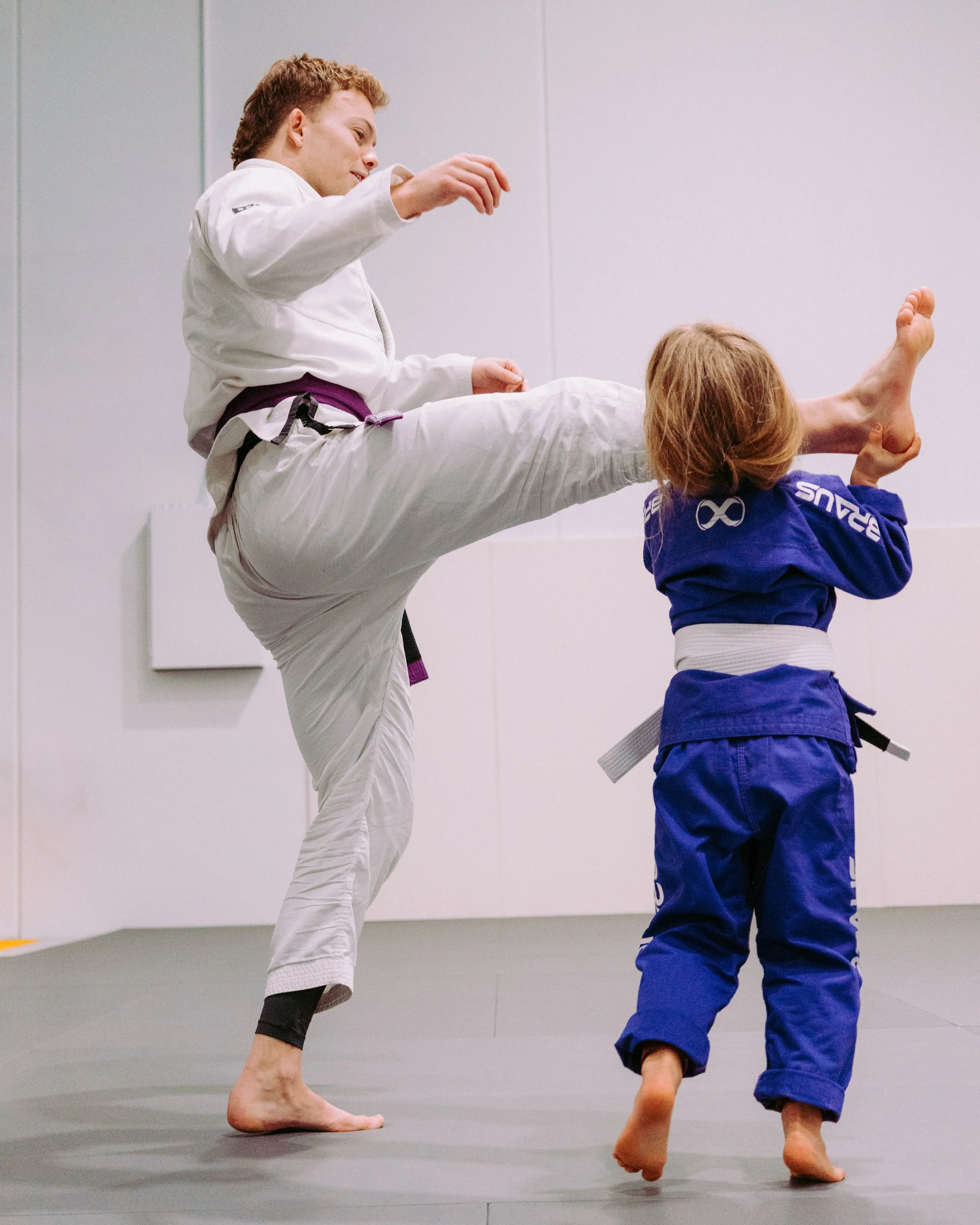 Kids BJJ sparring in gi at Melbourne Grappling Academy in Moorabbin.
