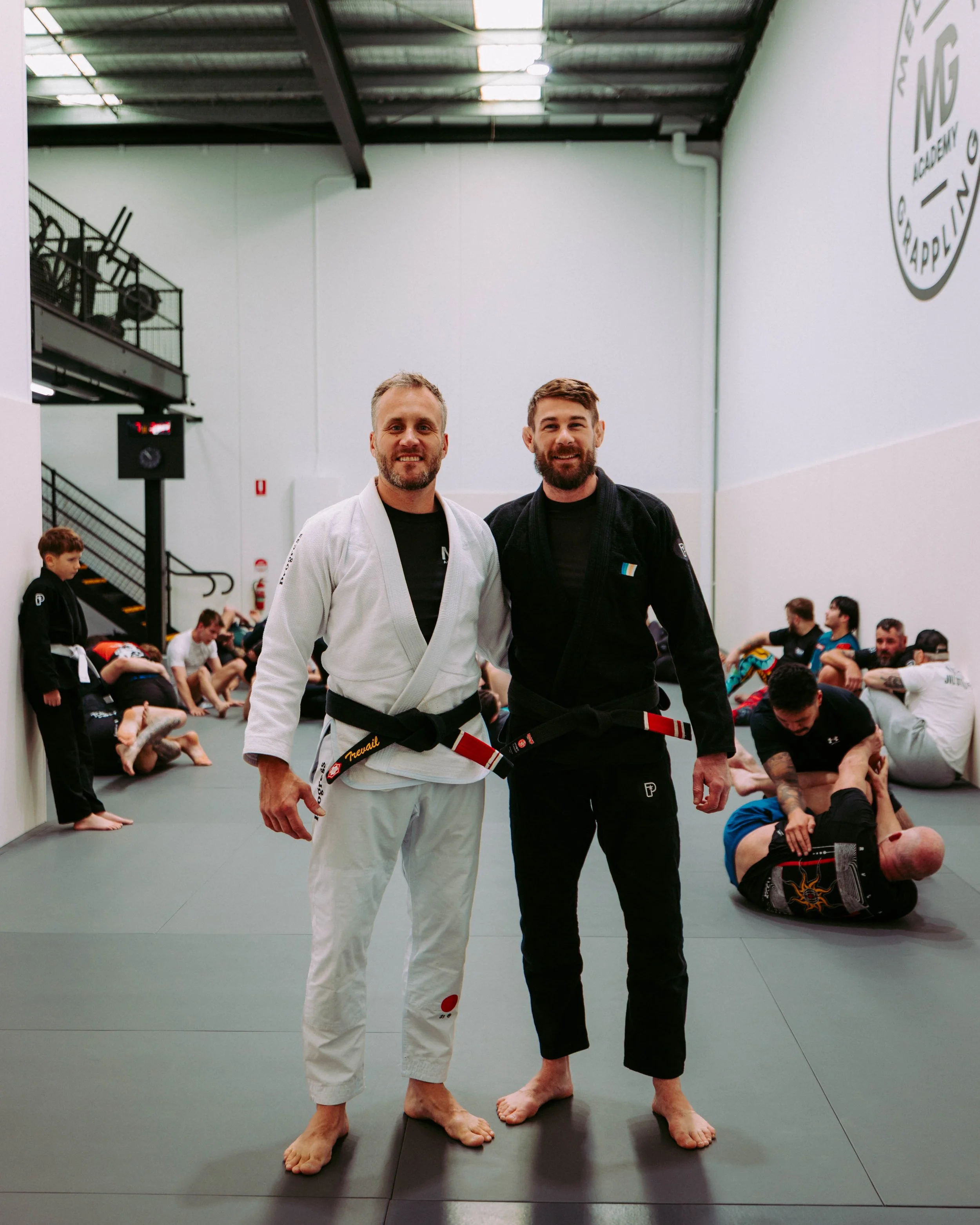 Tim Trevail and Tom Everett, owners of Melbourne Grappling Academy, during an open mat