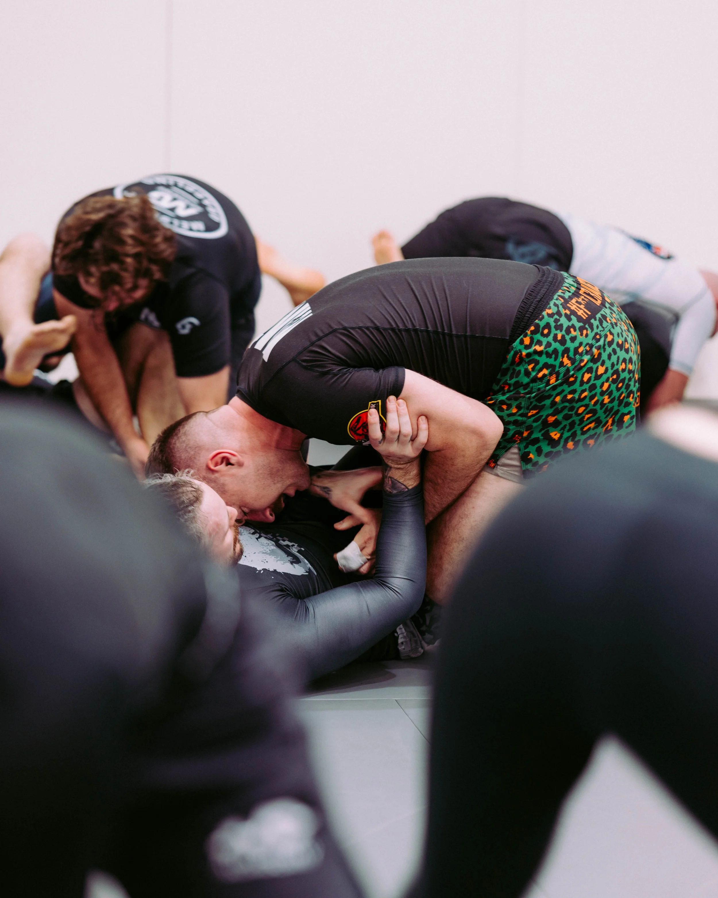 Members sparring and watching during an open mat session at Melbourne Grappling Academy, Moorabbin