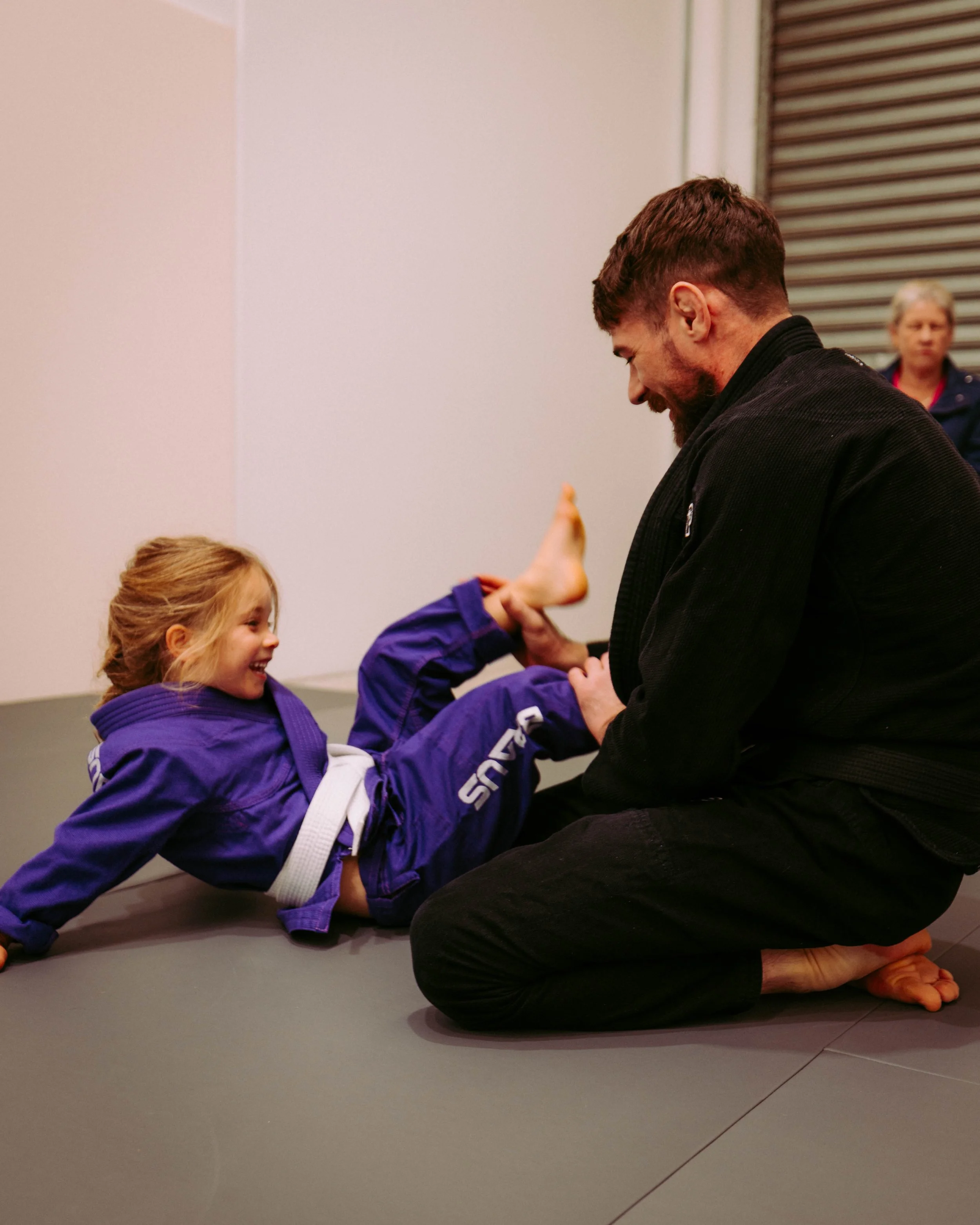 BJJ gi class sparring at Melbourne Grappling Academy in Moorabbin.