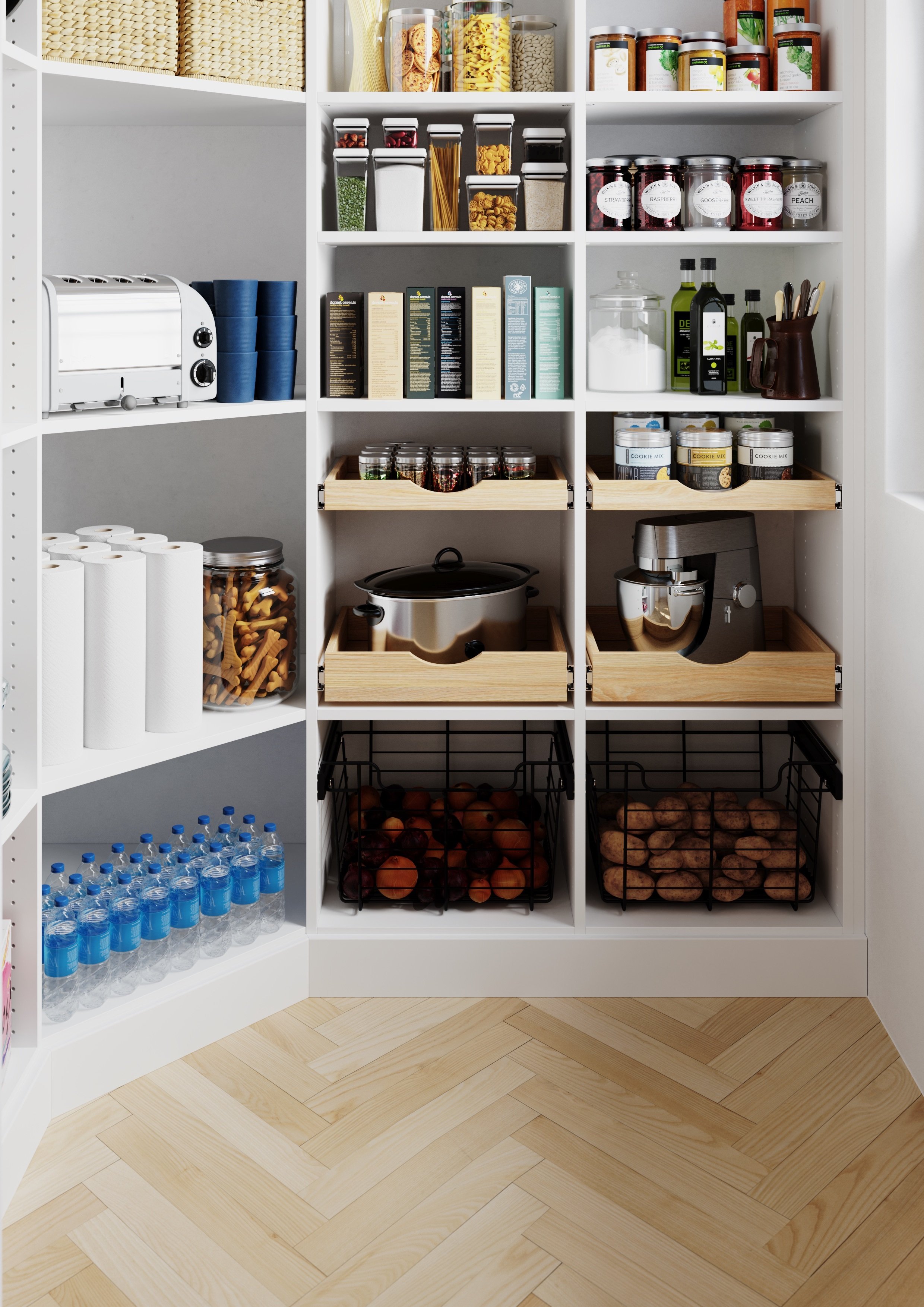 A well-organized kitchen pantry with shelves containing jars of spices, pasta, tea, and snacks, along with a bread toaster, paper towels, bottled water, and baskets of onions and potatoes on the floor.