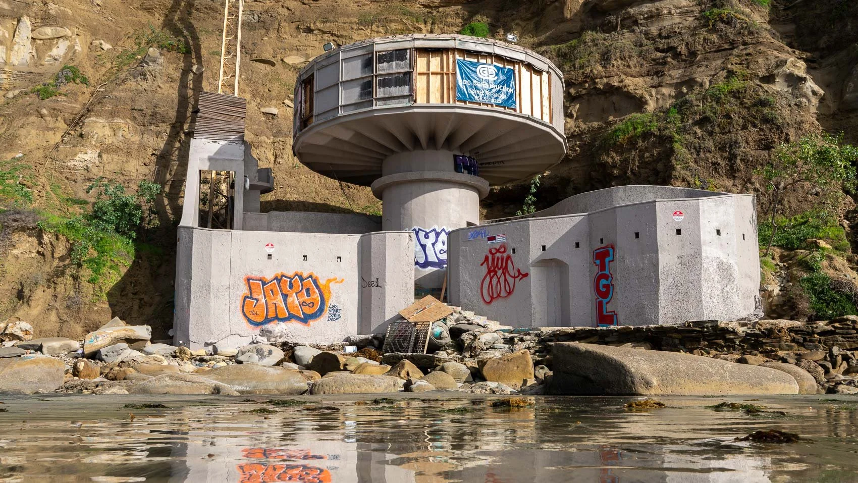   After being repainted the week prior, local graffiti artists have already returned to tag the iconic Mushroom House at Blacks Beach on Feb. 18, 2026.  