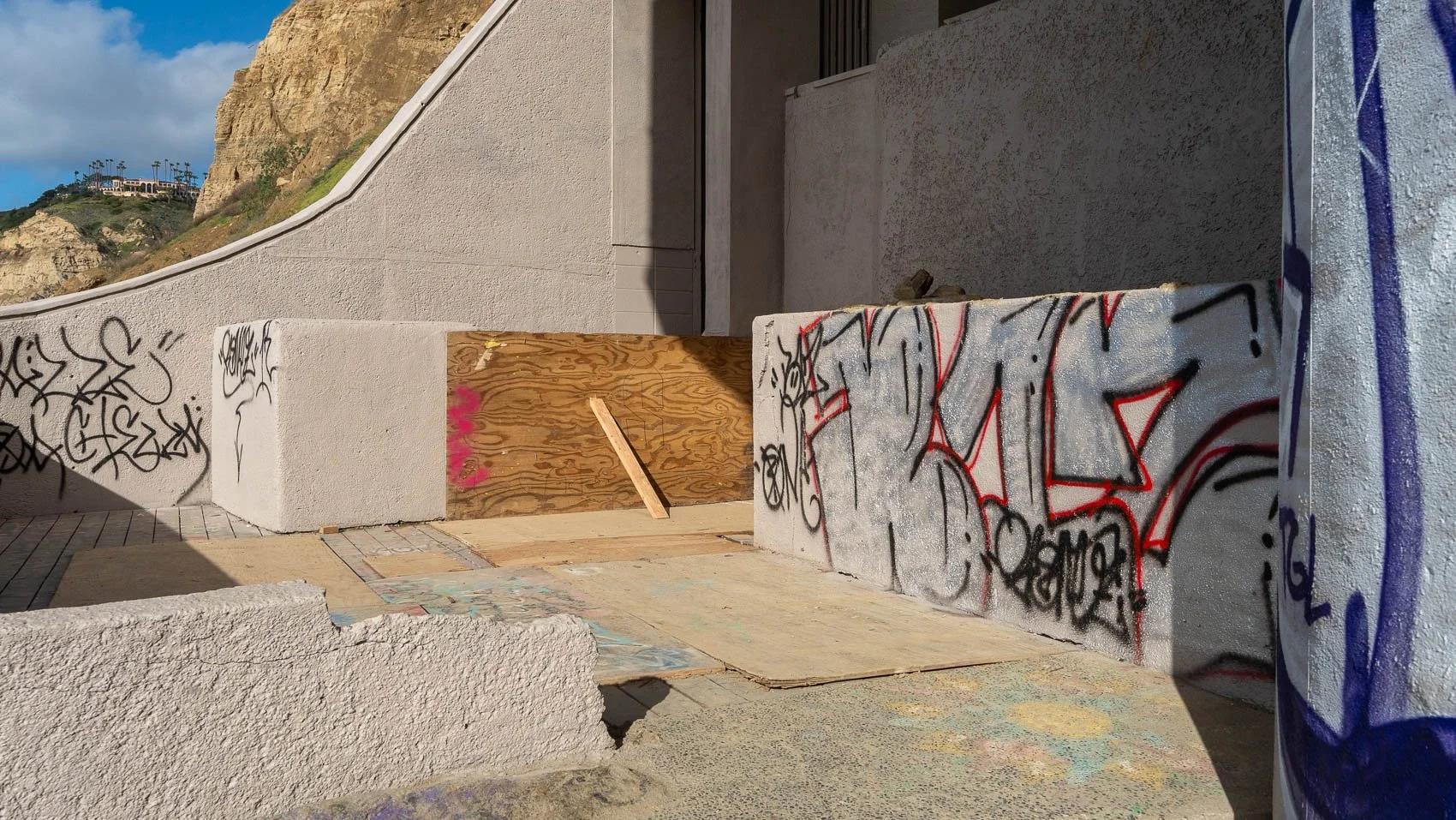   The walls of the patio had been repainted, but are covered in fresh tags.  