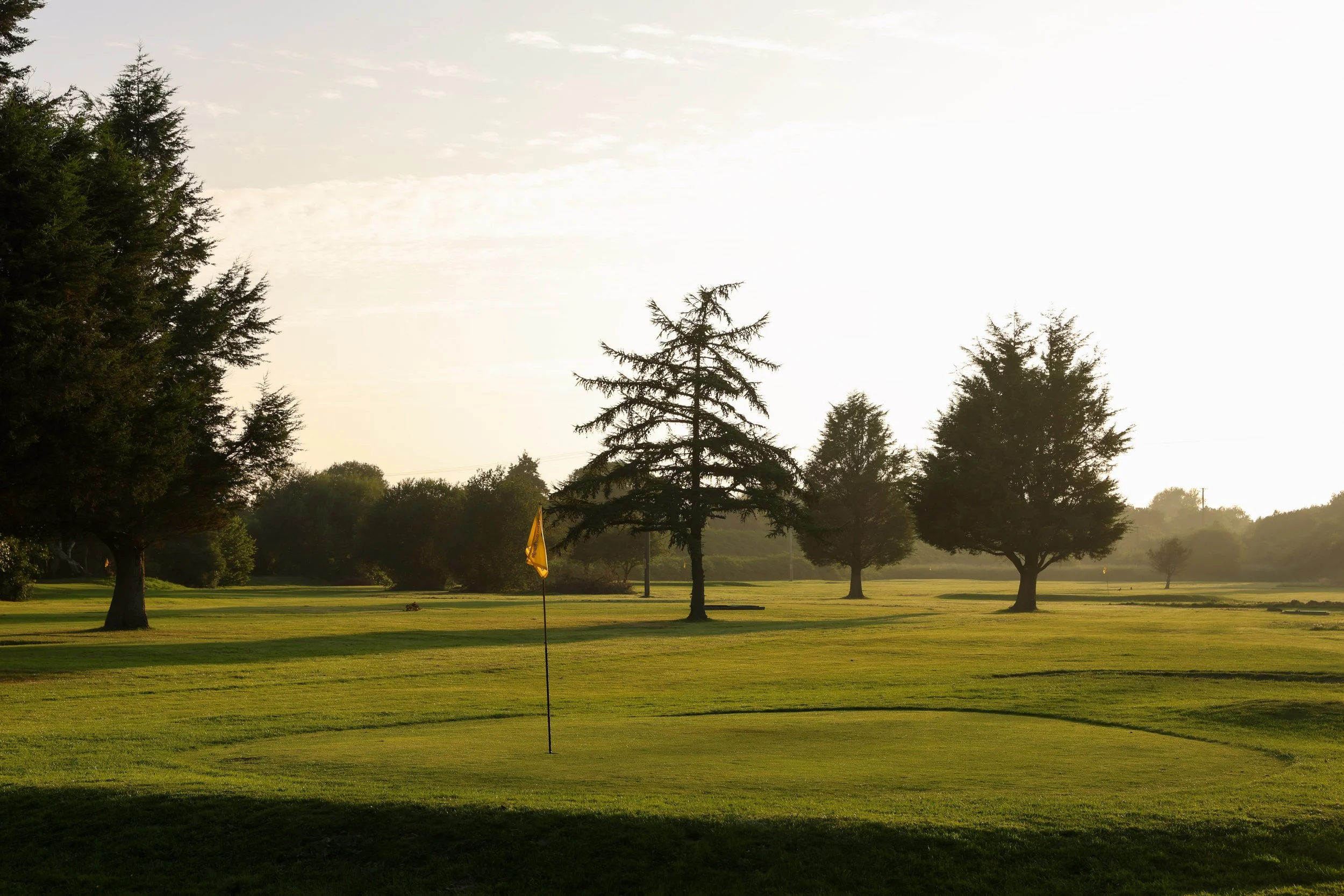 The sun setting over the par 3 course at Gowerton Golf Range, Swansea