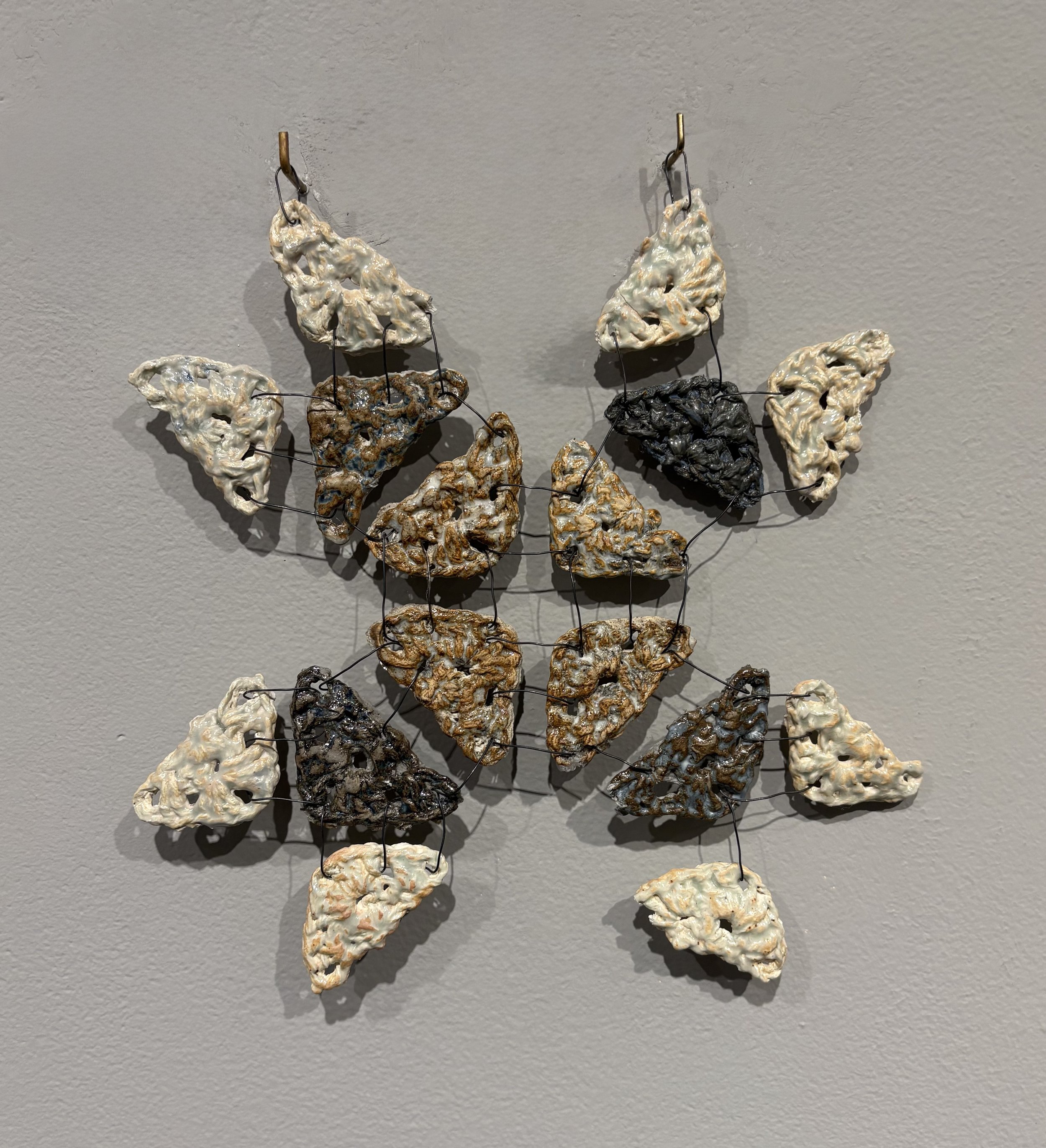 Misplaced Confidance, crocheted ceramics and wire, 2025