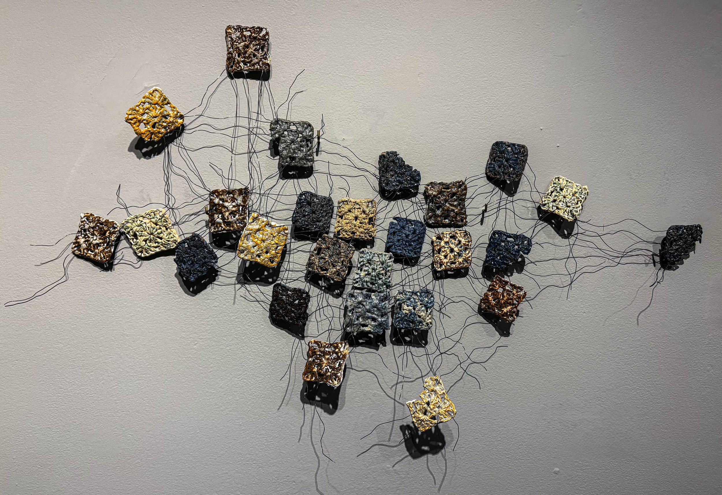 Stretch, Strain, and Settle, crocheted ceramics and wire, 2025