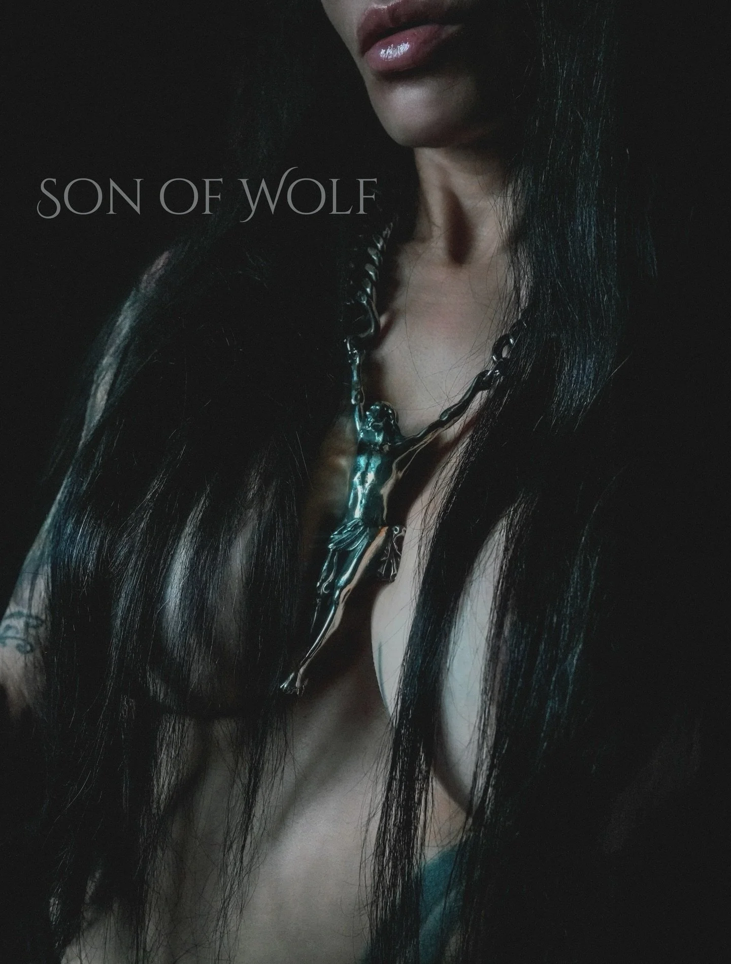 Christ in Chains choker. You can find this piece at sonofwolf.com. DM for custom sizing.