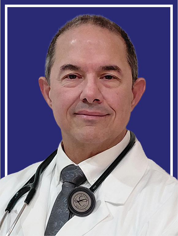 Dr Haskin, DO. A male doctor with short dark hair, wearing a white coat, a patterned gray tie, and a stethoscope around his neck, standing against a navy blue background.

Conciege Physician Services