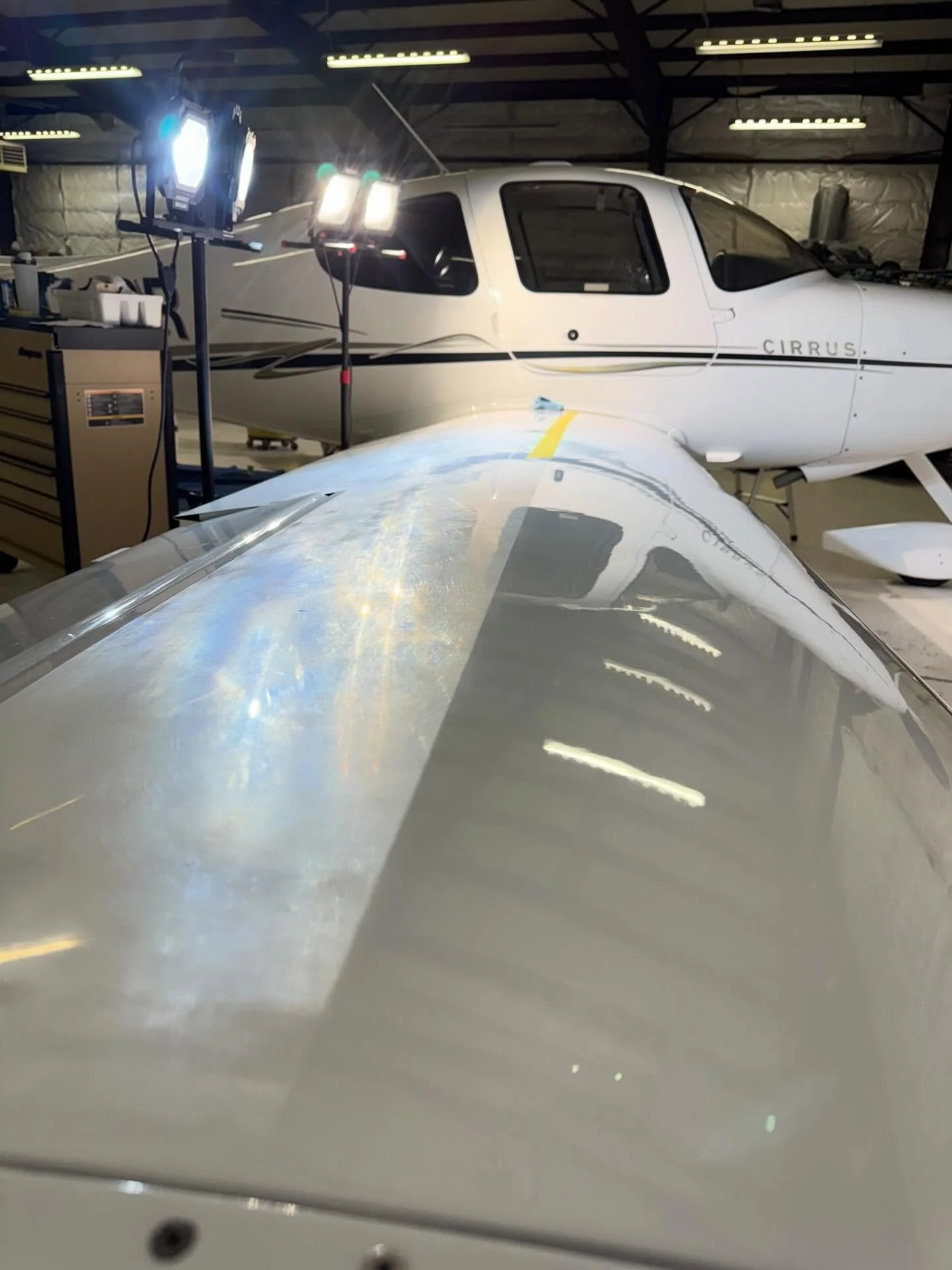 Polishing job to remove oxidation and cloudiness worked great!  That is the line you see in the first picture. The left side (closest to the lights) has not been polished yet, but the right side has! (Front area of the wing)