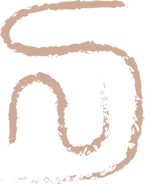 Close-up of two stylised letter 'S' in beige, which is Satya Space's brand mark.