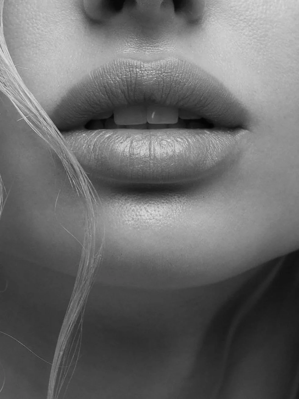 Over time, our lips naturally change, often appearing less defined, with shifts in texture and hydration.

As part of the normal ageing process:
&rarr; Collagen and elastin gradually decline, contributing to fine lines around the mouth
&rarr; Lip bor