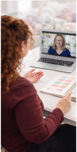 Woman on zoom meeting with styling planner.