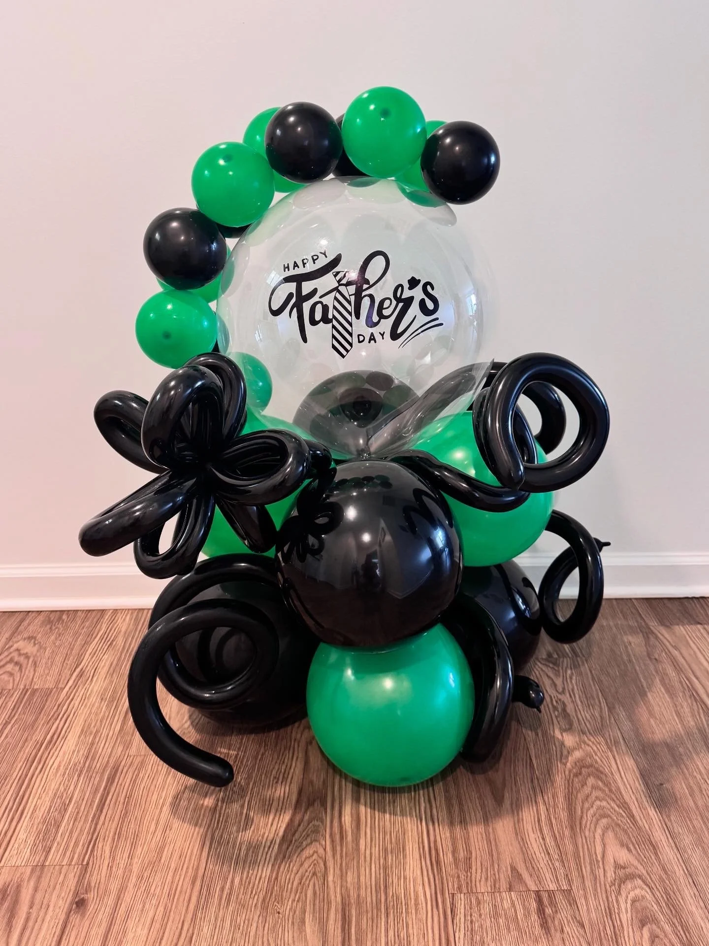 Wrapped Bubble Balloon for Father's day with Vinyl wording, green and black balloons.
