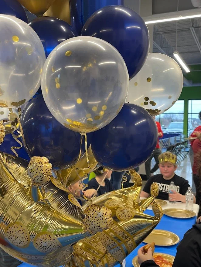 Theme Development - Royalty Fit for a King, Blue, Gold confetti balloons.