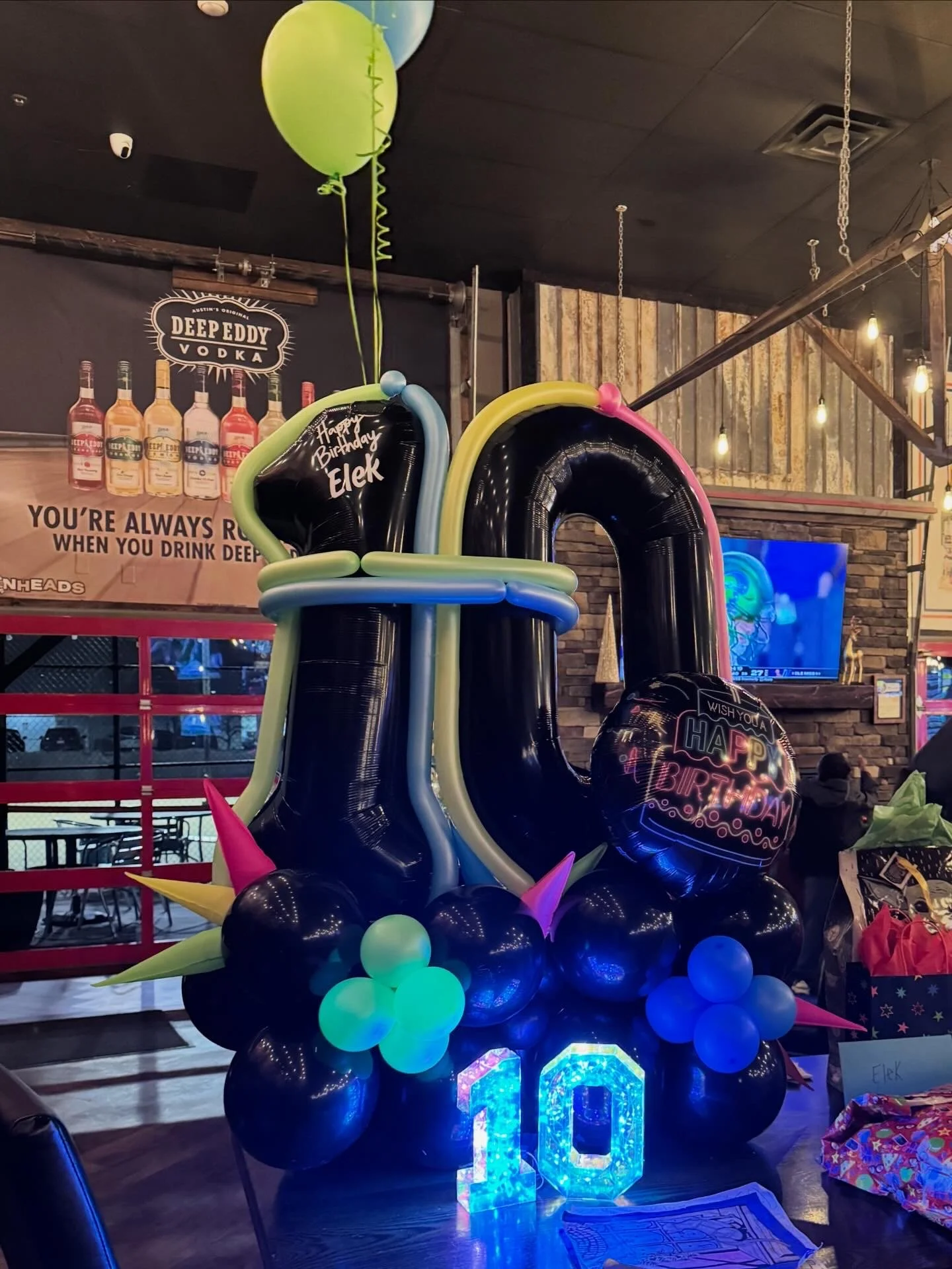 Theme Development - Japanese Domestic Market (JDM) - Balloon Number stack with black number 10 and neon accents. 