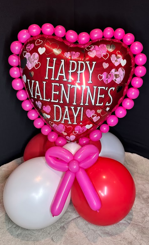 Valentine's Day foil heart balloon stack with red and white balloons. 