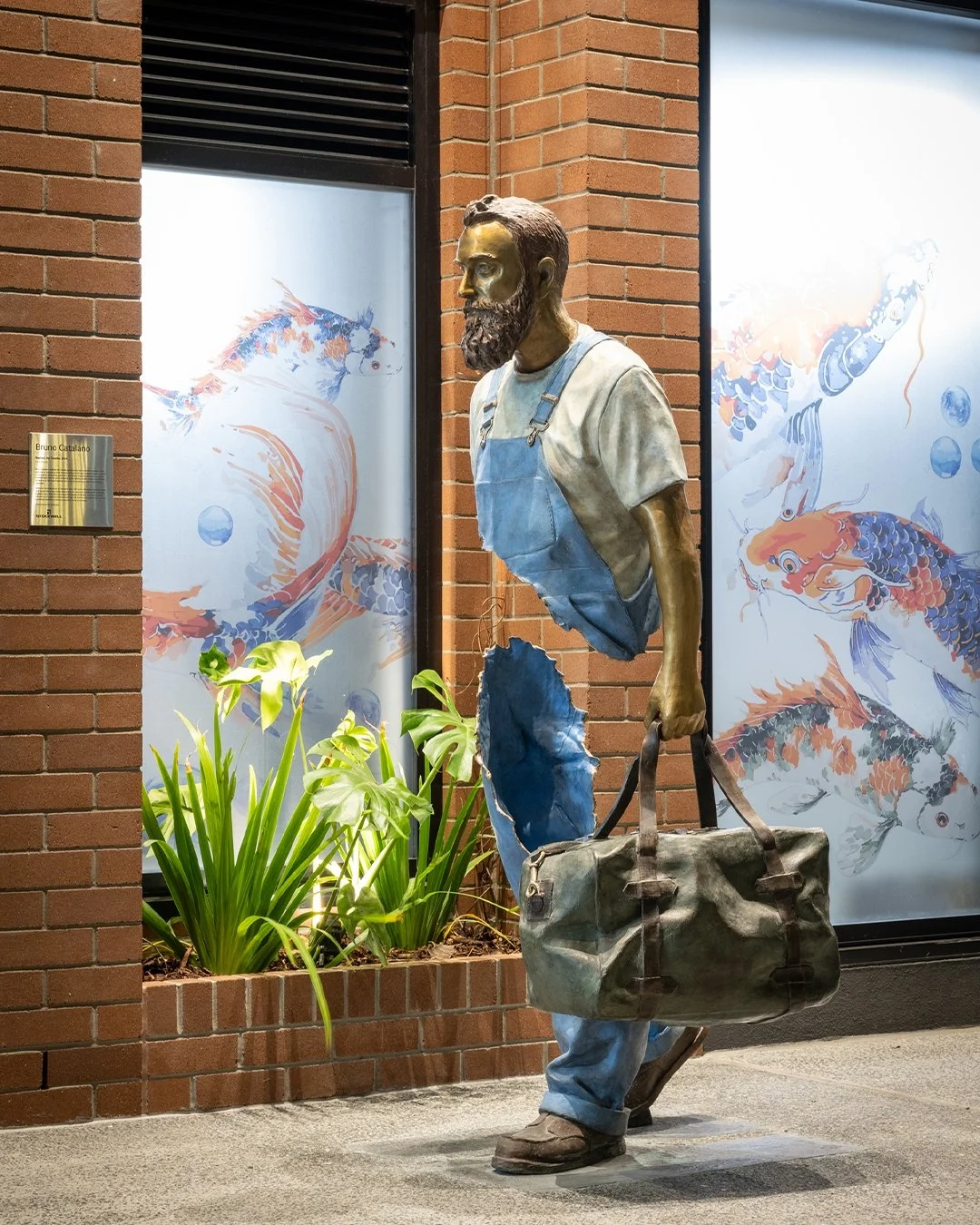 Meet Raphael, the Traveller 2024 by Bruno Catalano — a figure on the move, now part of the everyday flow of Fish Lane. 🧳✨ Pause in the lane, watch the world pass, and let art carry you somewhere new. 🌏